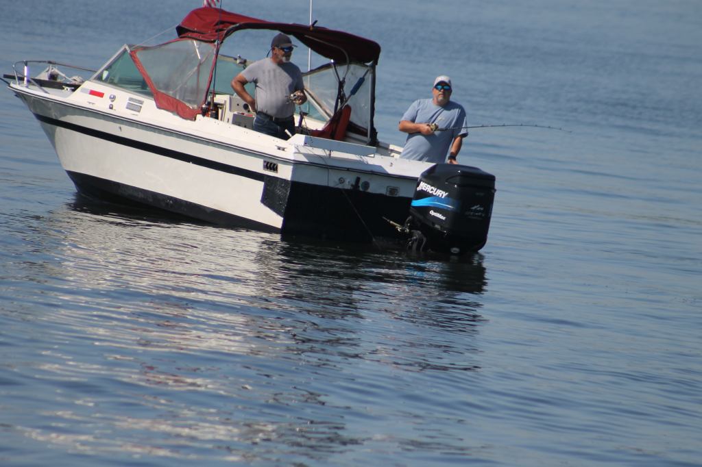 Buddies on Small Boat fishing