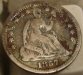 seated_half_dime_1857-O_obv__6_013109.png - 